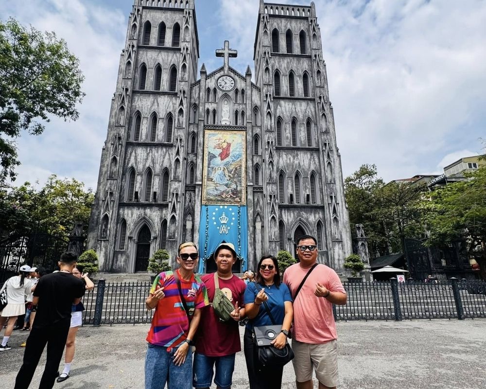 Taking-photos-before-St-Joseph-s-cathedral
