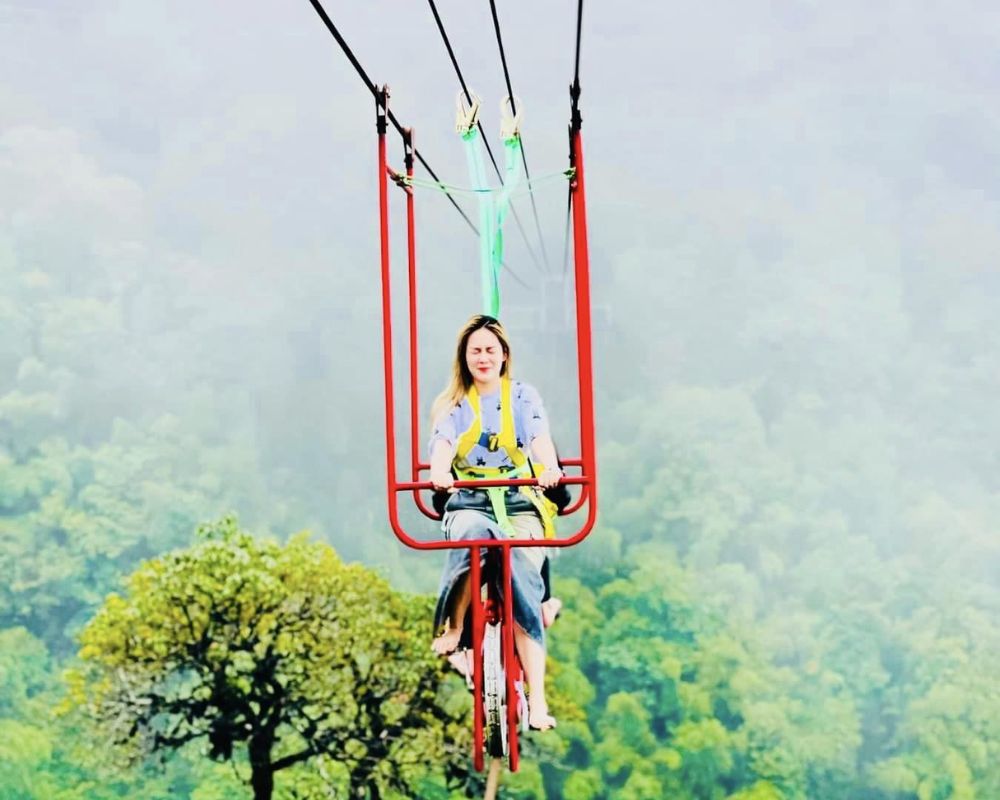 Girl-participating-in-adventure-game-at-Sapa-Glass-Bridge