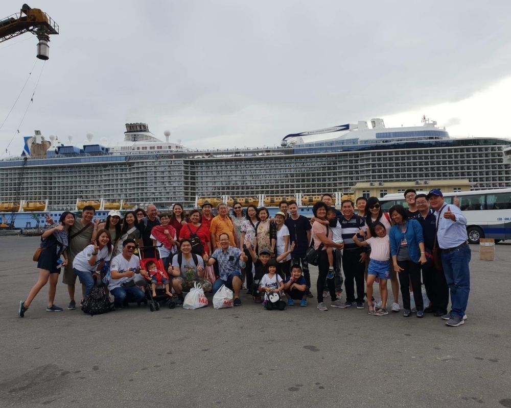Tourists-take-pictures-at-the-ship-at-Chan-May-port