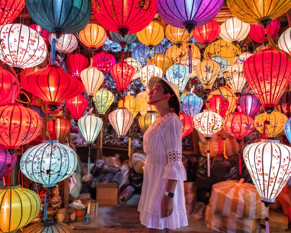 Woman-taking-pictures-with-lanterns-in-Hoi-An